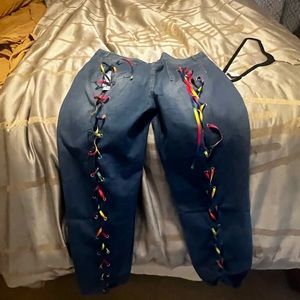 Fashion jeans with lace up colored strings. Fits plus size 2x or 3x